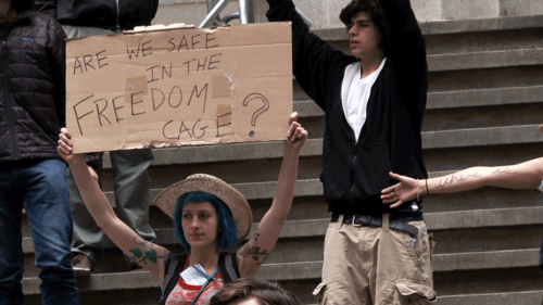 FreedomCageLaurenSign.png