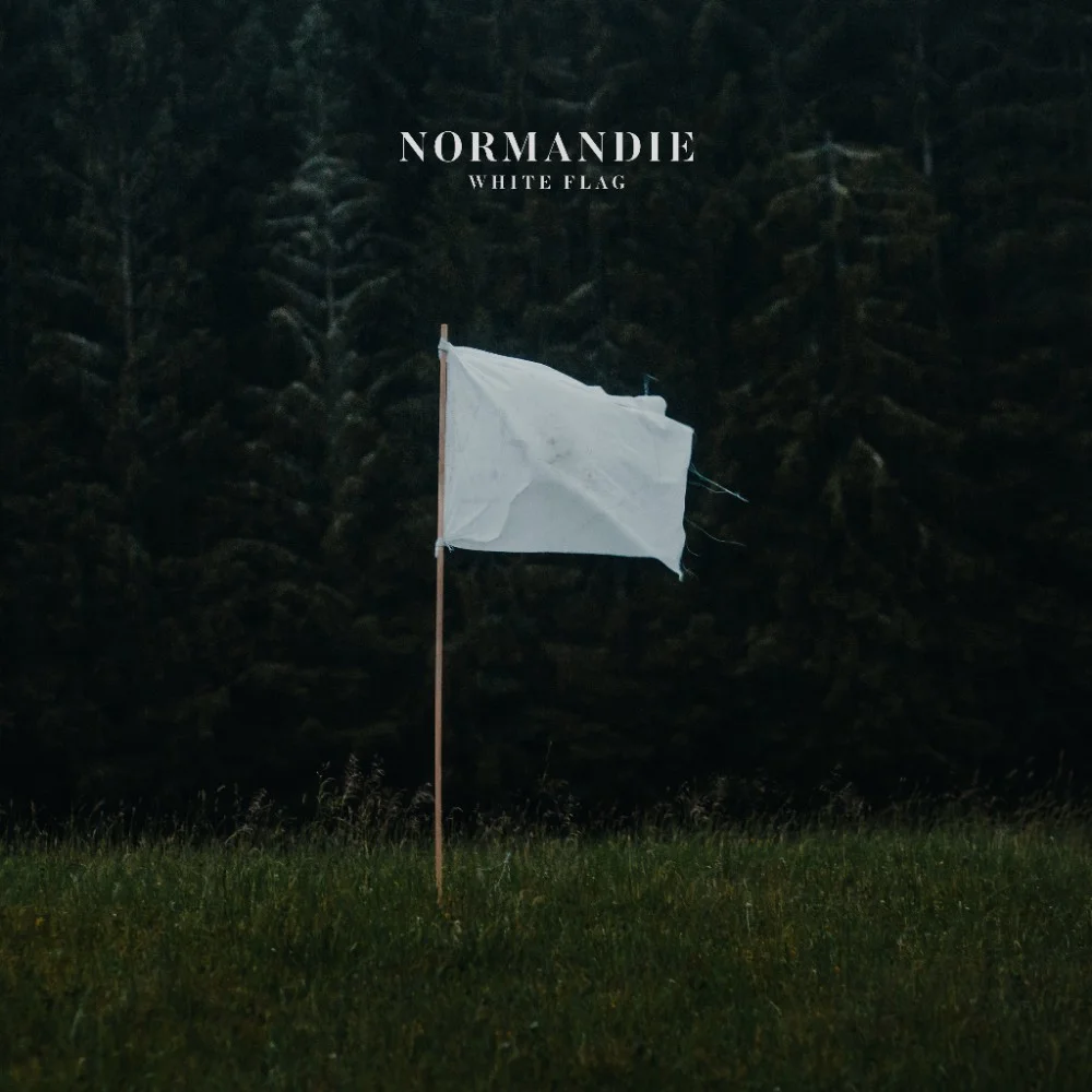 White Flag tracklisting: 1. Ecstasy 2. White Flag 3 Enough 4. Dead 5. (Don't) Need You 6. The Bell 7. Moth 8. Maniacs 9. Summer 10. Keep F*****g It Up 11. Fever 12. Heaven 