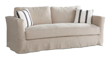The square arm, softly tailored look of a Reece slip covered sofa