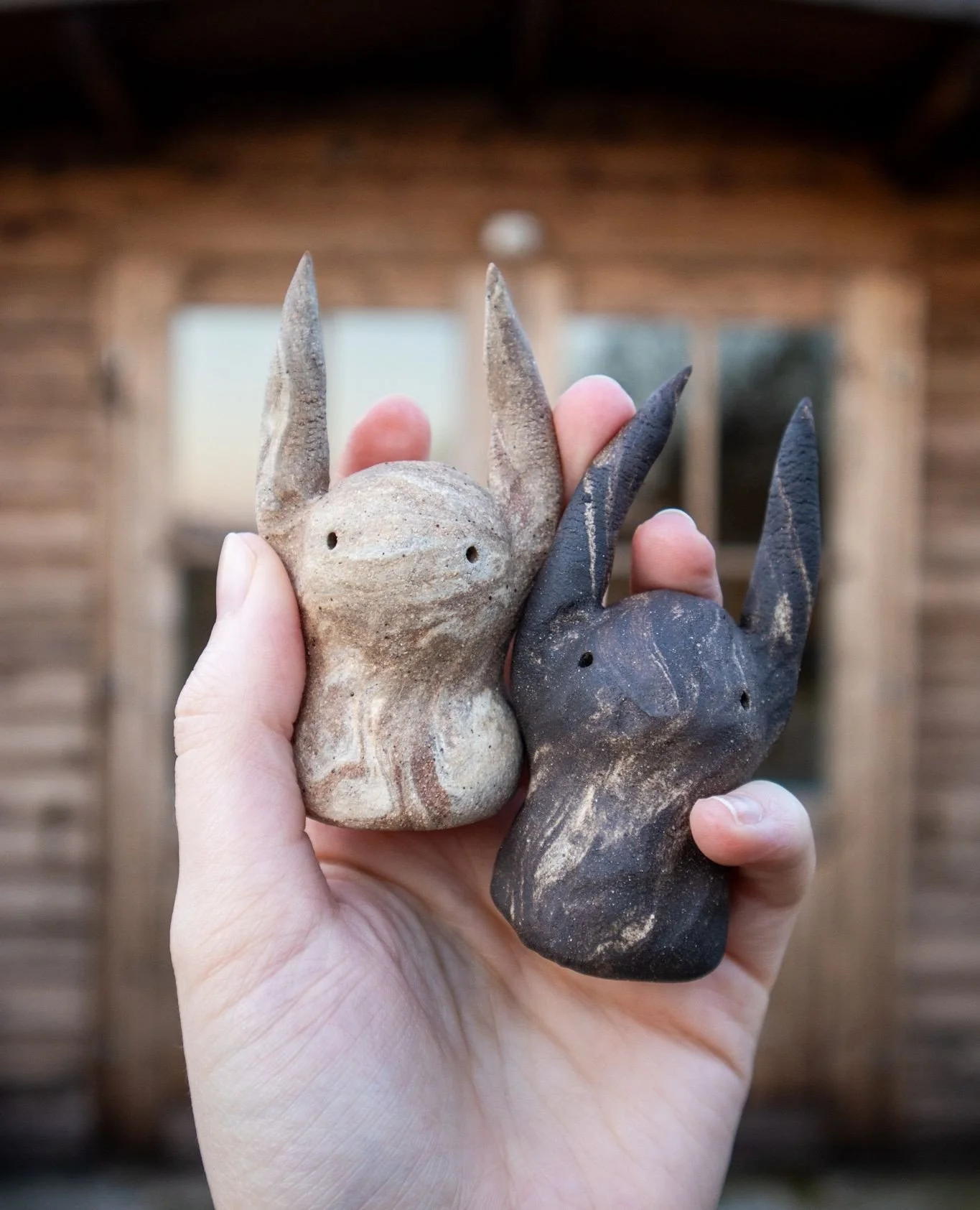 Which do you prefer? The Mini Monster on the left is made from a mix of terracotta and flecked white stoneware and the right one is made from a mix of the same white stoneware and smooth black clay. Do they remind anyone else of caramel and dark choc