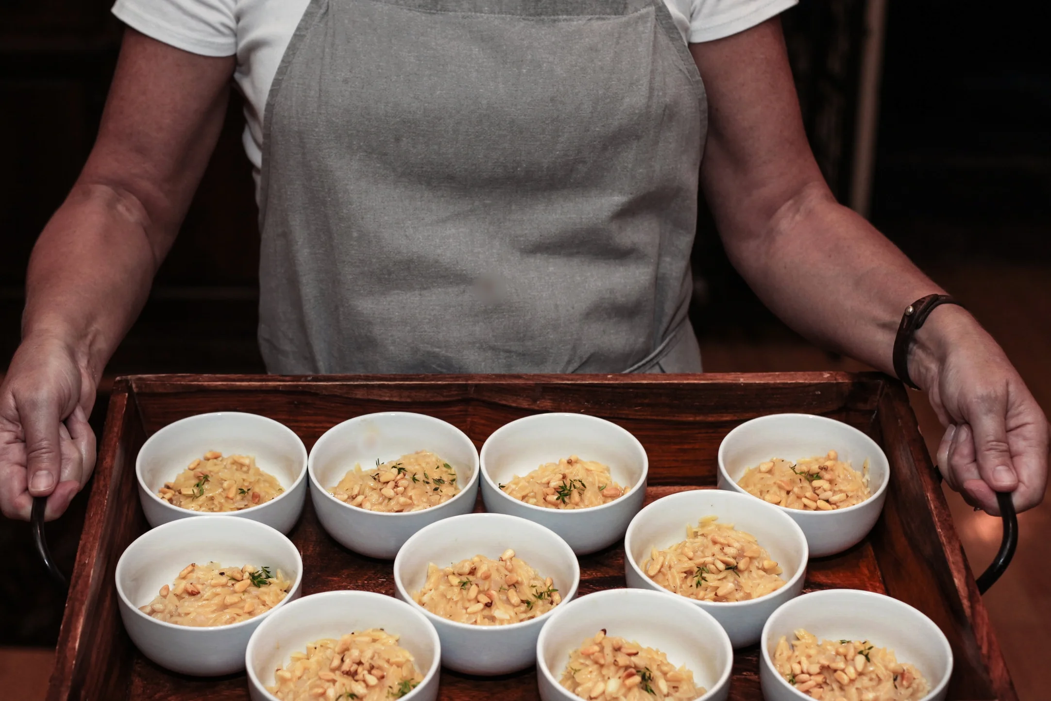 Lauren Lane serving orzo risotto