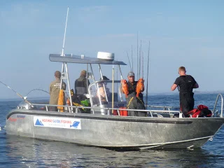 17 helleflyndere og fiskeri efter rødfisk..