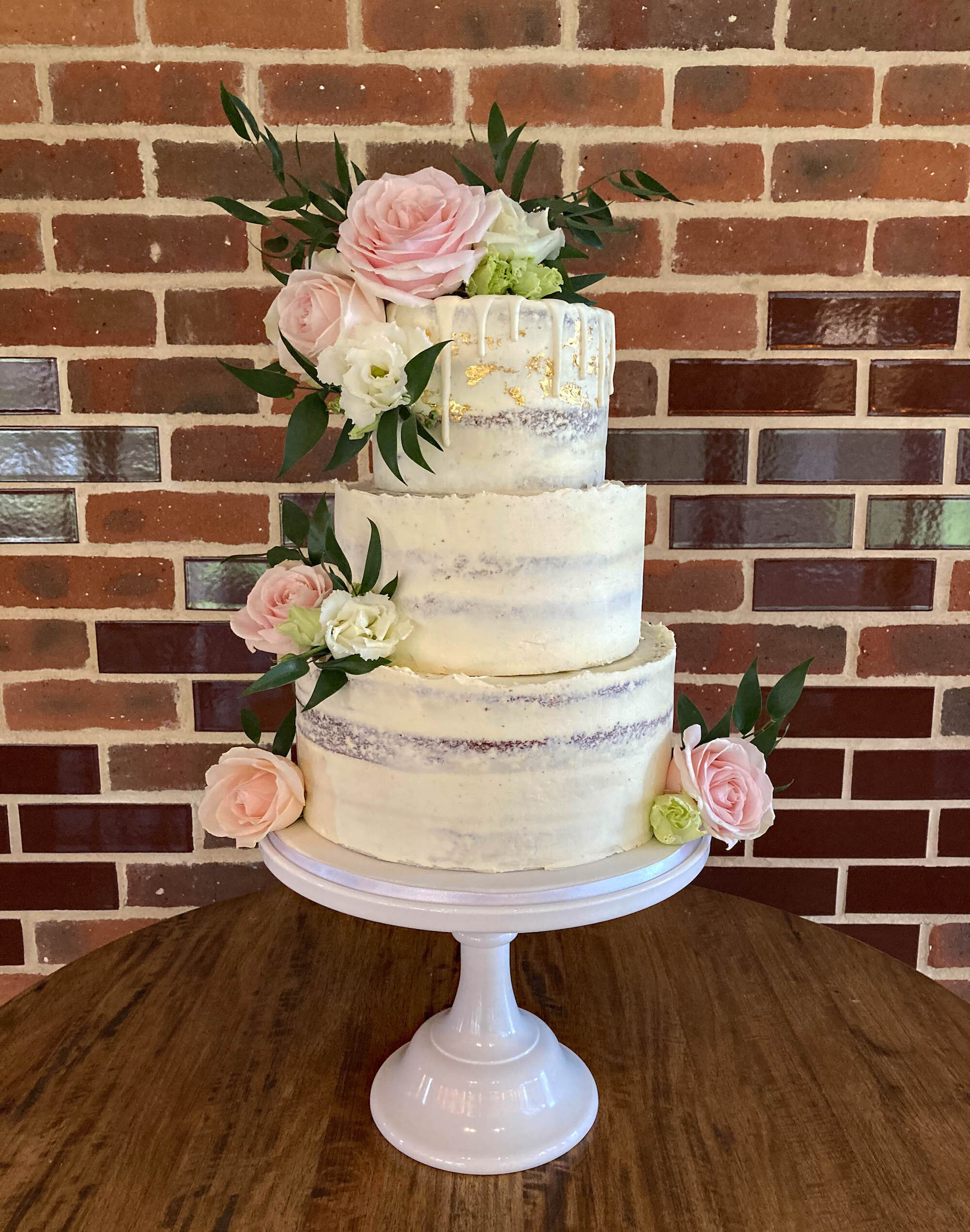 Semi-naked drip wedding cake