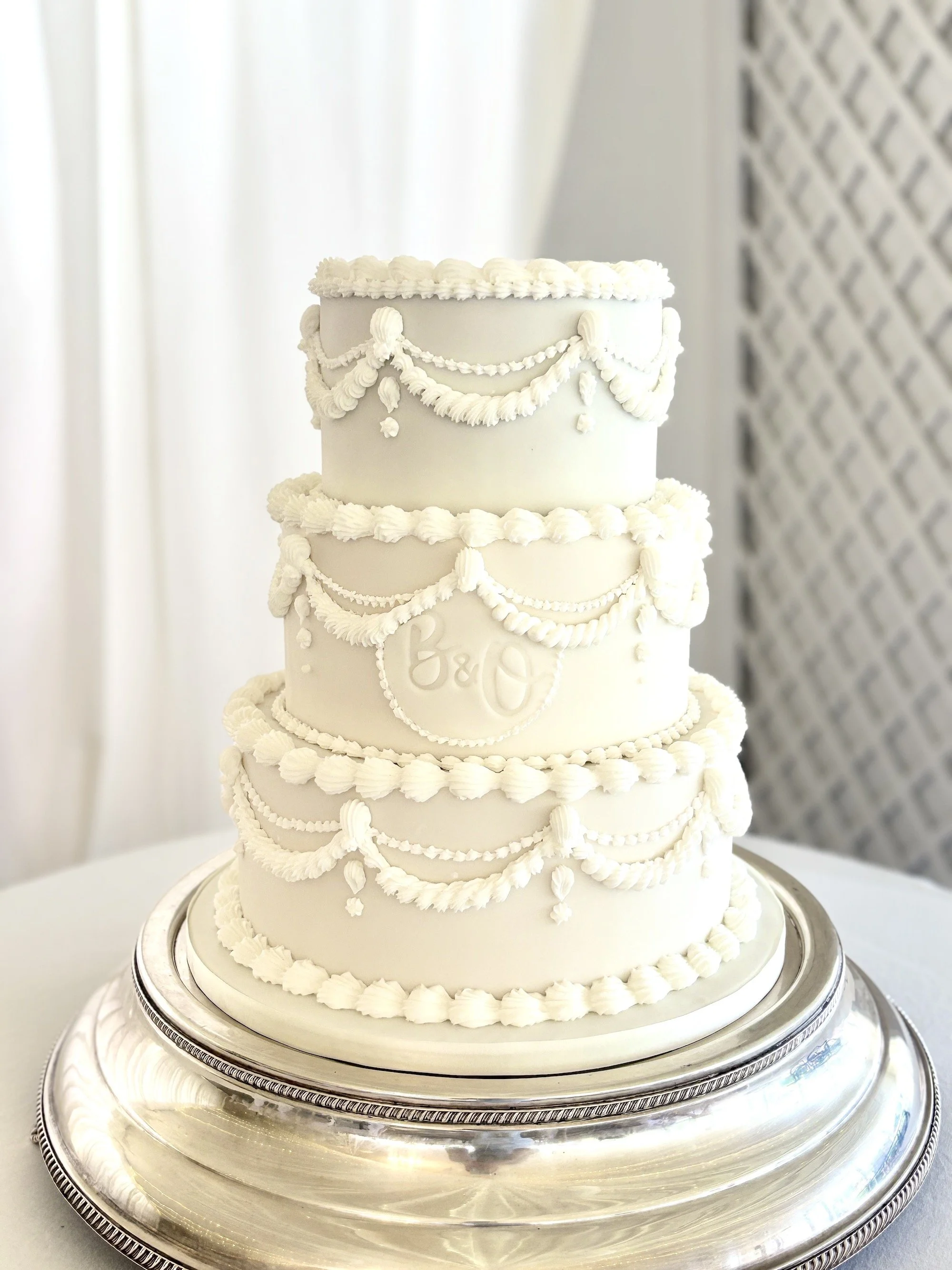 3-tier white Lambeth wedding cake with monogram