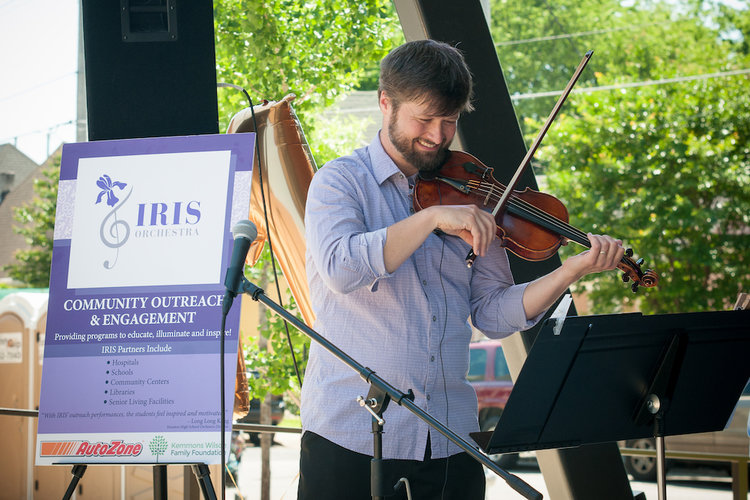  The world-famous Iris Orchestra entertains the crowd at the Overton Square Spring Concert, a family-friendly outdoor festival with face painting, balloon art, and more 