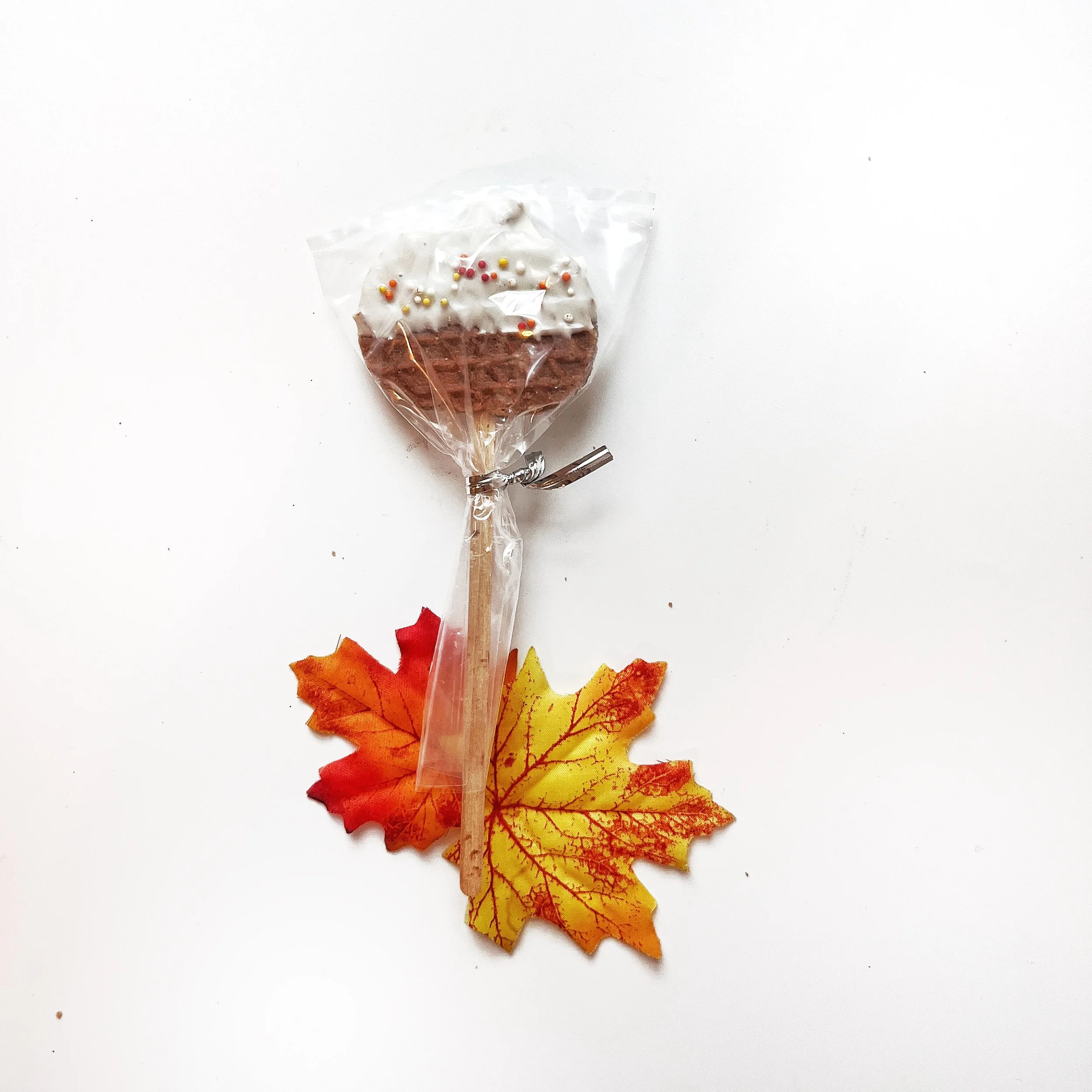 White Chocolate Sprinkle Wrapped Pumpkin Lollipop.jpg