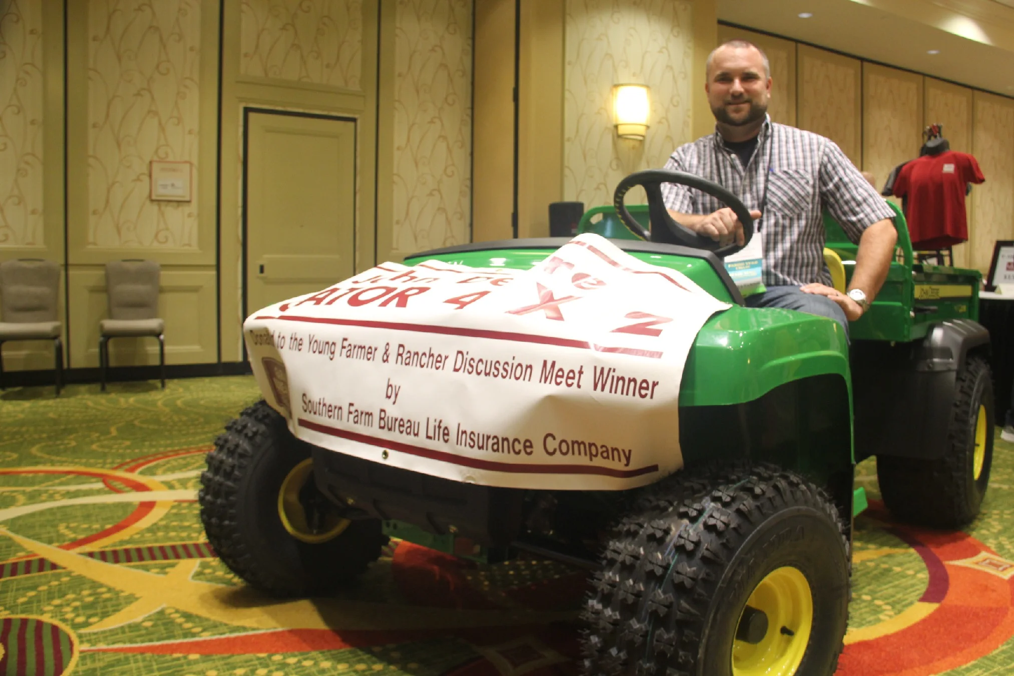 ADAM CAUGHERN WON A JOHN DEERE GATOR UTILITY VEHICLE IN THE LOUISIANA FARM BUREAU'S YOUNG FARMER AND RANCHER DISCUSSION MEET.