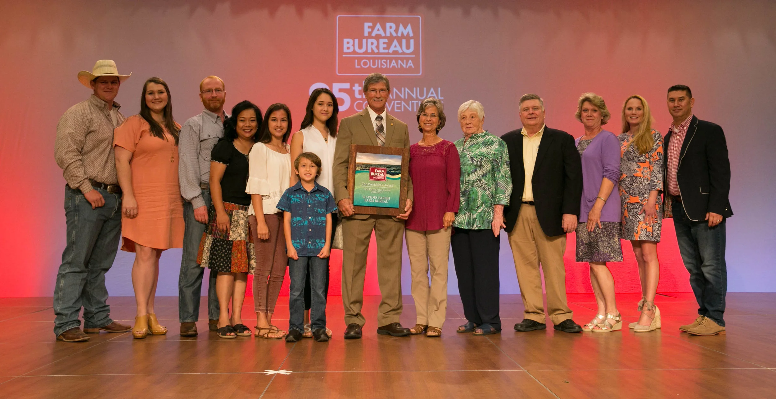 Rapides Farm Bureau delegates celebrate winning the 2017 Louisiana Farm Bureau President's Trophy.
