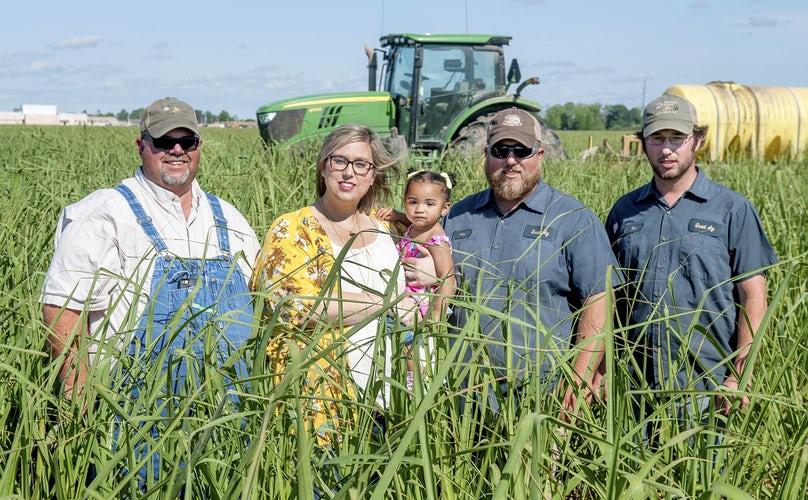 Katie Sistrunk and her daughter Piper join her father and brothers on the family sugarcane and soybean farm in Iberville parish. Katie is the winner of the Louisiana Farm Bureau's 2017 Excellence in Agriculture Award. Photo by the Greater Baton Rouge Business Report.