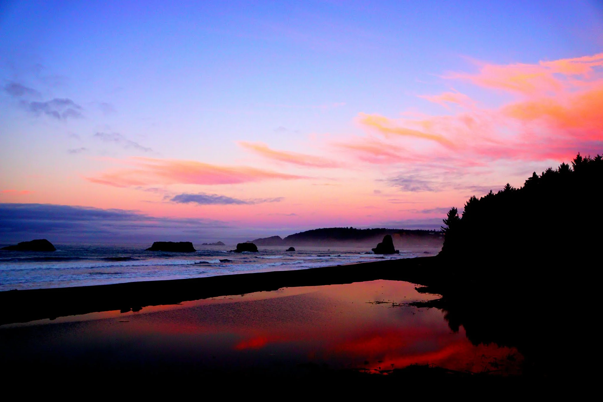 We are just four hours from the coast cities of Florence, Bandon, and Crescent City. The above picture was taken on a weekend trip to Port Orford, where residents camped on the beach. The Oregon Coast's Highway 101 is famous for its winding, verdant scenery and is dotted with towns both quaint and eclectic. Travel far enough north and you can visit the Tillamook Creamery and come home rich in cheese beyond your wildest dreams, travel south to find yourself among the Redwoods of northern California.