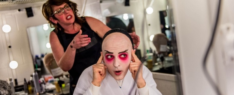 In the makeup chair for Pong in Utah Opera's TURANDOT, with wig/makeup artist Shelley Carpenter. (Photo: Trent Nelson / The Salt Lake Tribune)