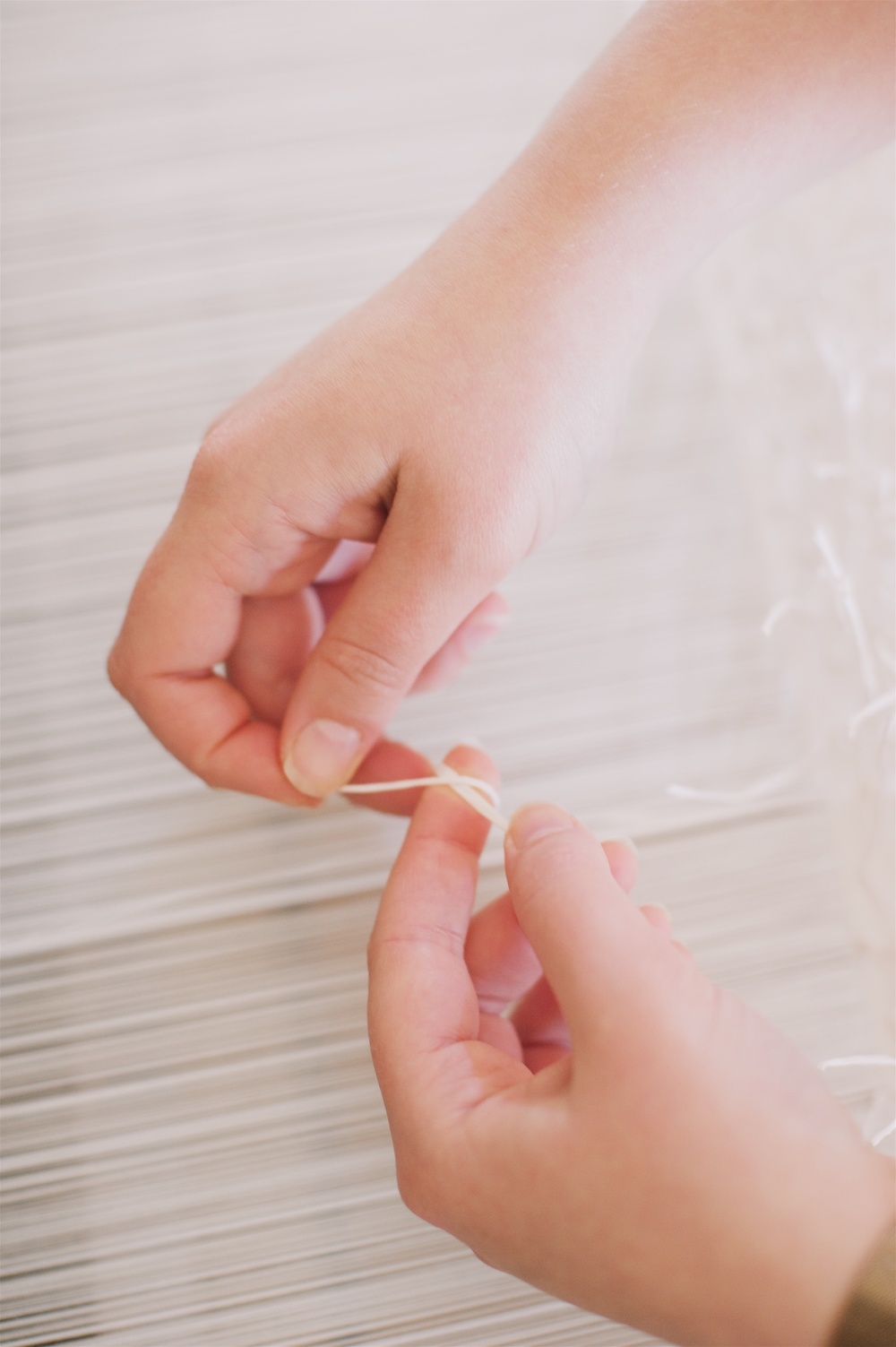 Tying a paper knot
