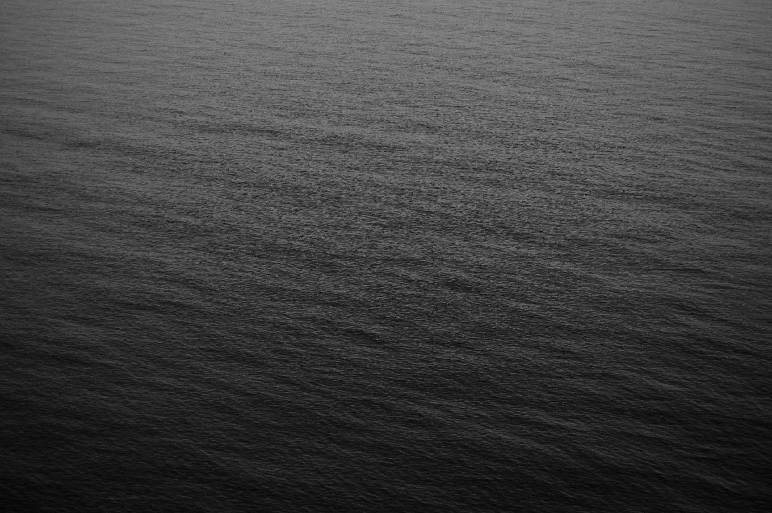 black ocean photo-1449028288989-df05d40bcbb4.jpeg