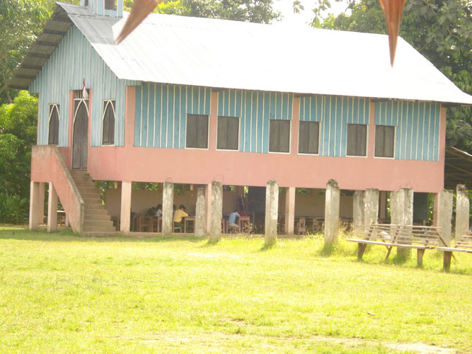 Community church building with open class rooms under building.