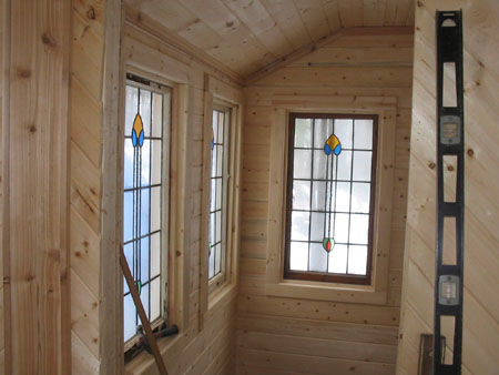 The walls in the side room are complete except for sealing the wood.