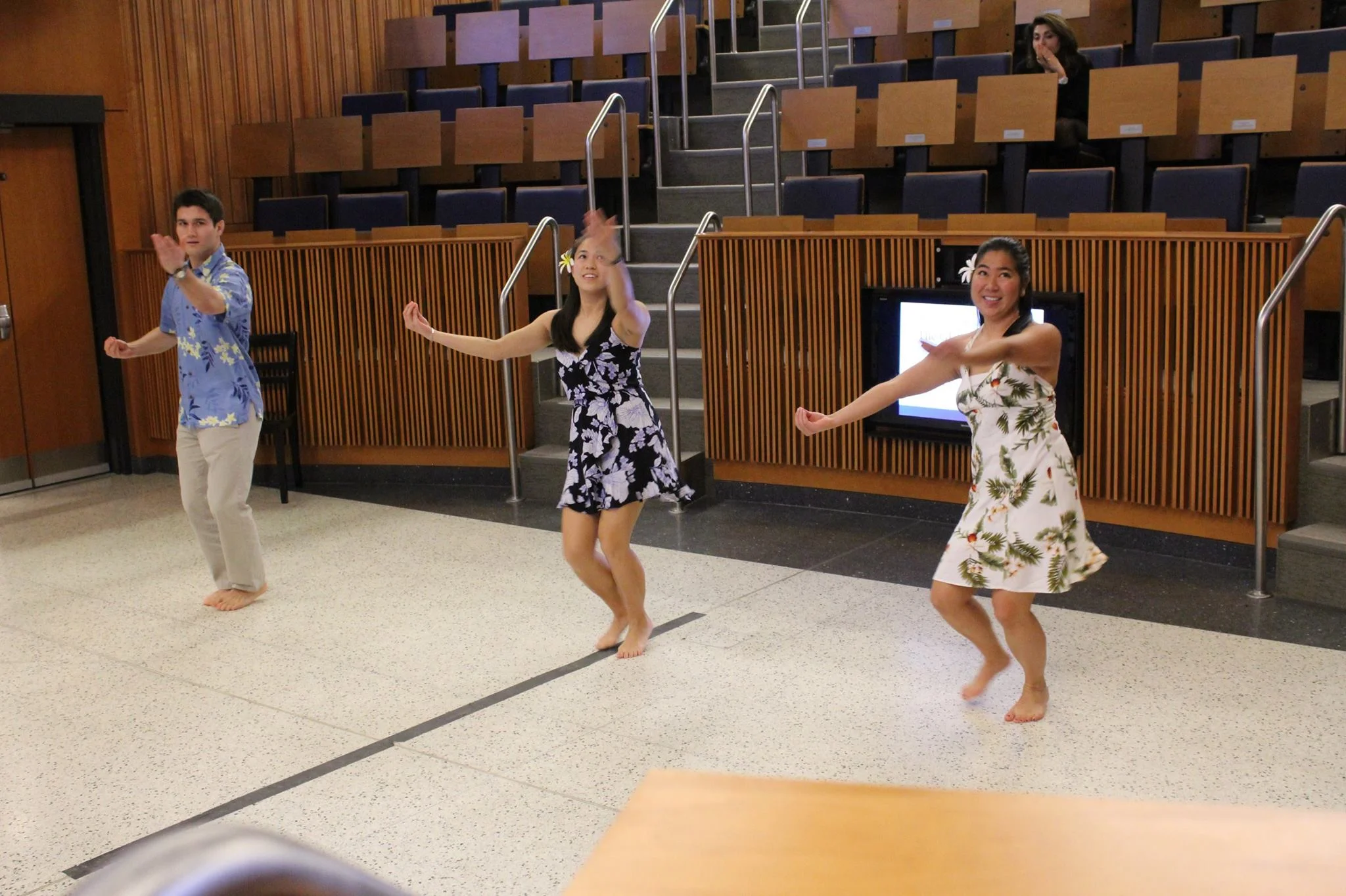 Brett Will (M2021), Kellie Wo (M2021), and Callie Takahashi (M2020) perform hula to He Mele No Lilo.