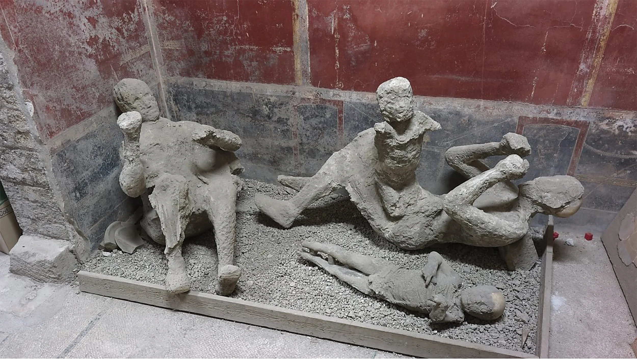 Plaster casts of a family from House of the Golden Bracelet
