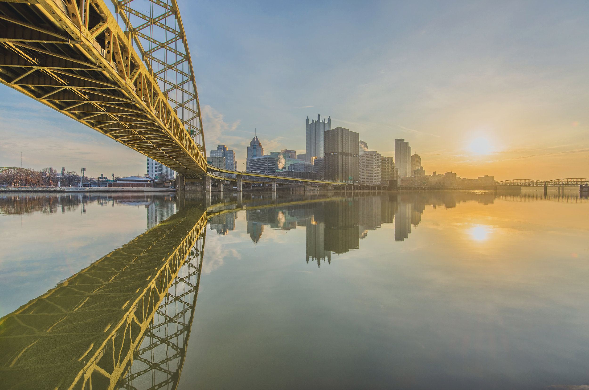 Sunrise_below_the_Ft._Pitt_Bridge_in_Pittsburgh_along_the_Monongahela_River-(ZF-4141-55655-1-001).jpg