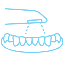 Icon of denture being scanned