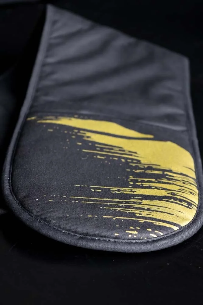 rocketstgeorge-black-oven-gloves-with-gold-flash-lowres-closeup2.jpeg