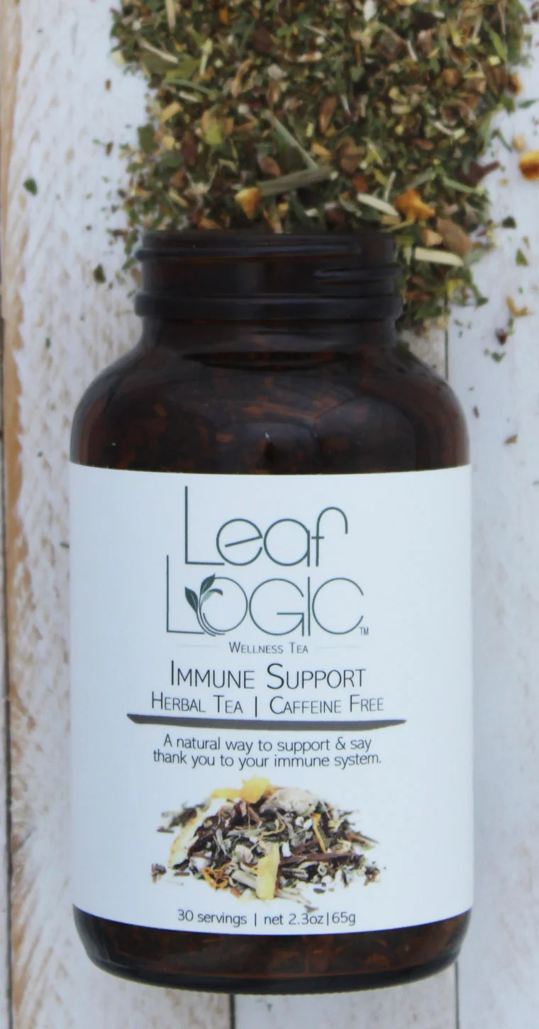 Immune Support Amber Bottle Open white wood cropped.jpg