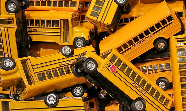 IMAGE 1 (" School Buses ," by Dean Hochman. Licensed under Attribution 2.0 Generic (CC BY 2.0) .)