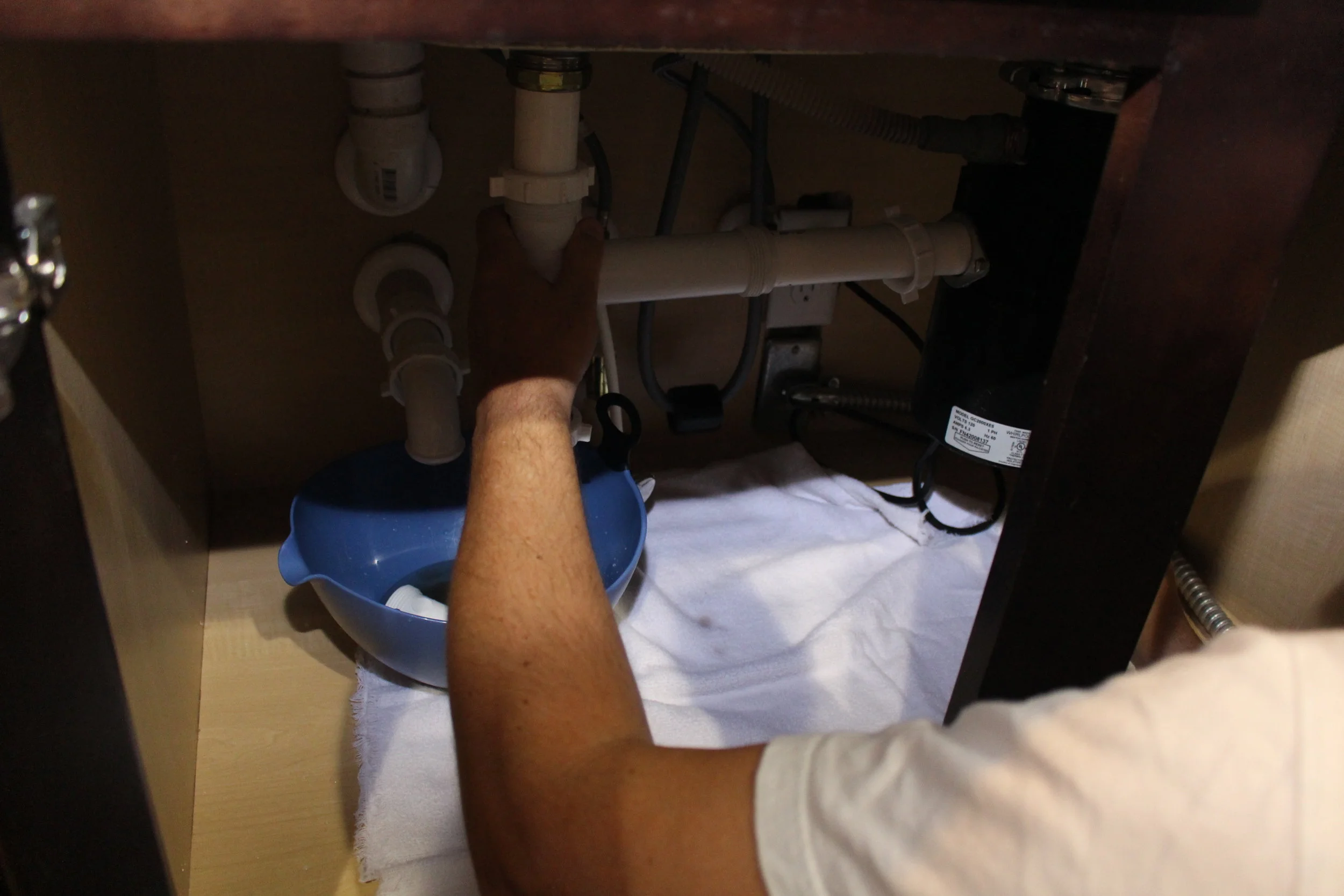 unclogging a garbage disposal
