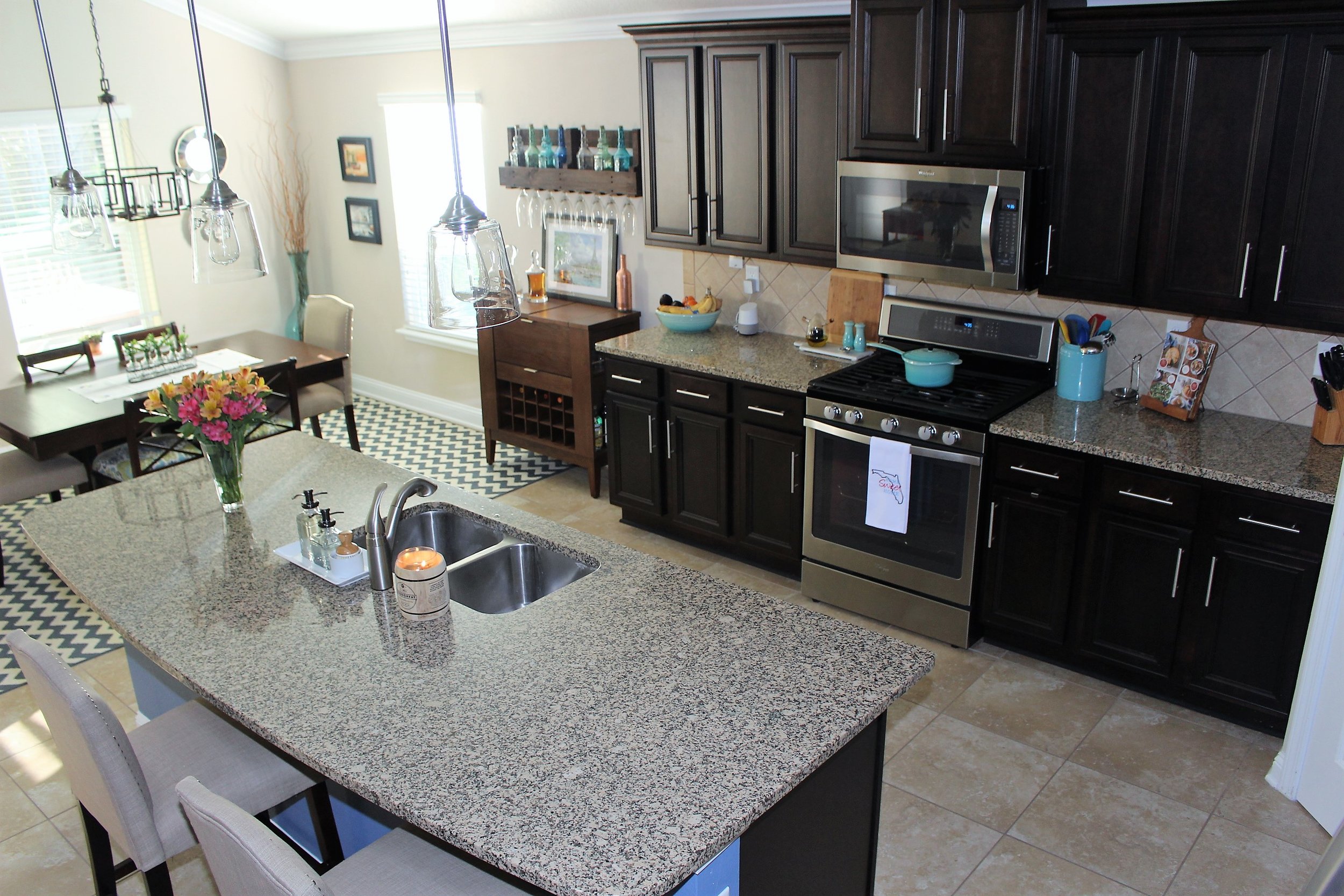 The microwave, stove, sink and fridge all got a wipe down with Mrs. Meyers Multi-Surface Concentrate.
