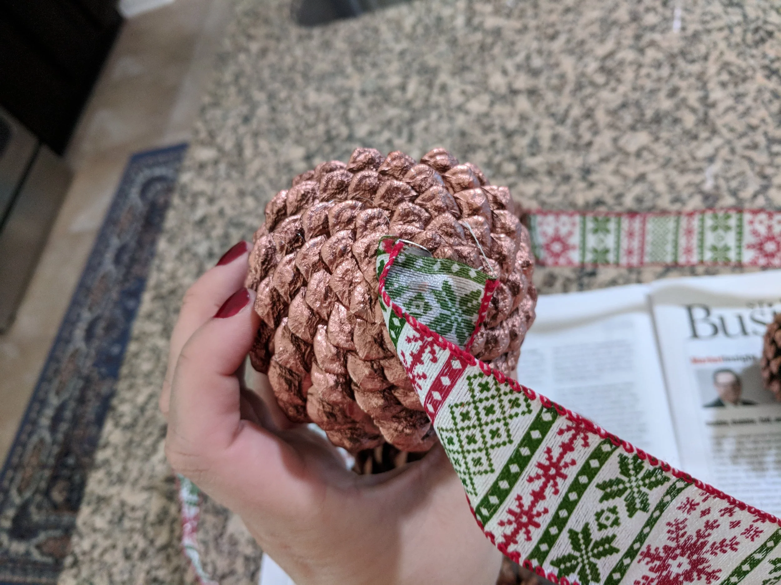 Apply your ribbon and apply pressure to make sure the hot glue holds.