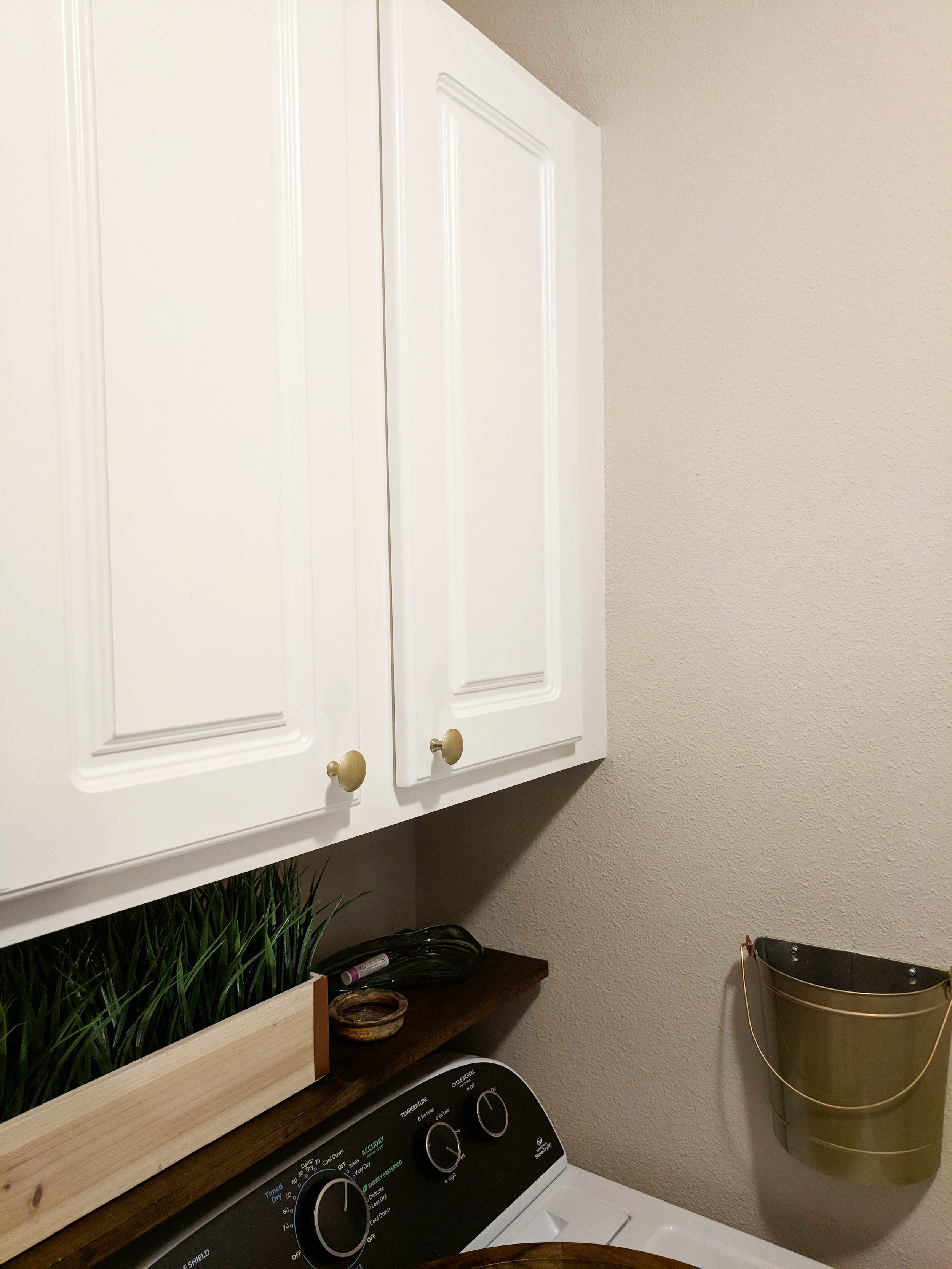 adding hardware to cabinets