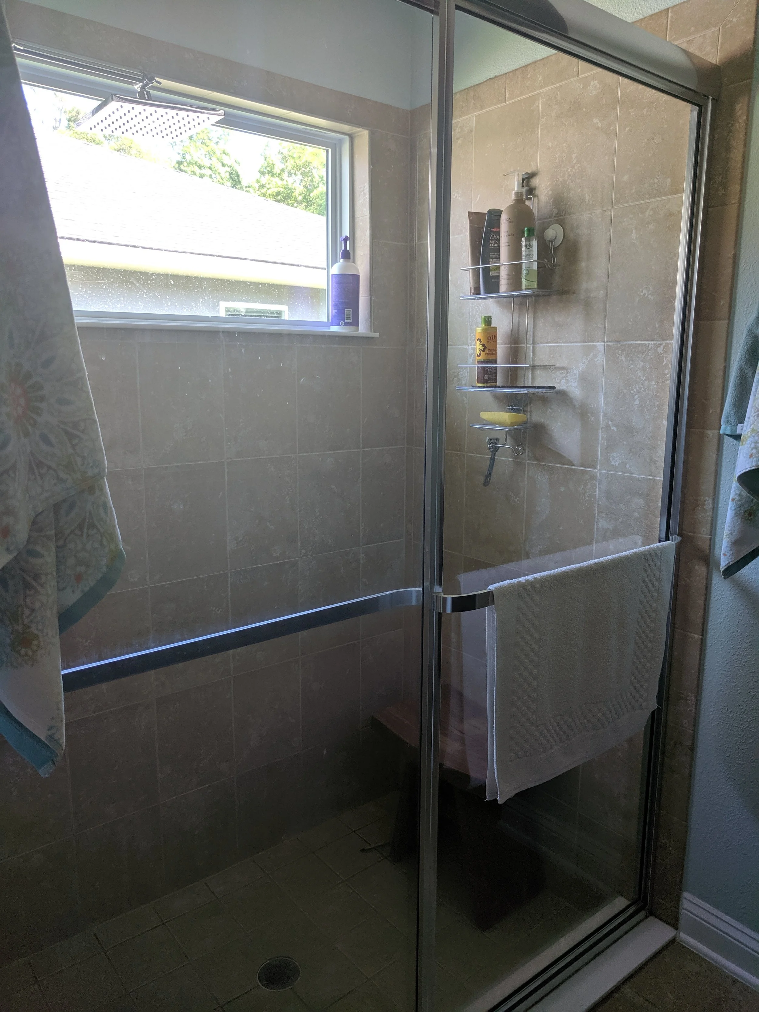 BEFORE: Saying goodbye to these shower doors!