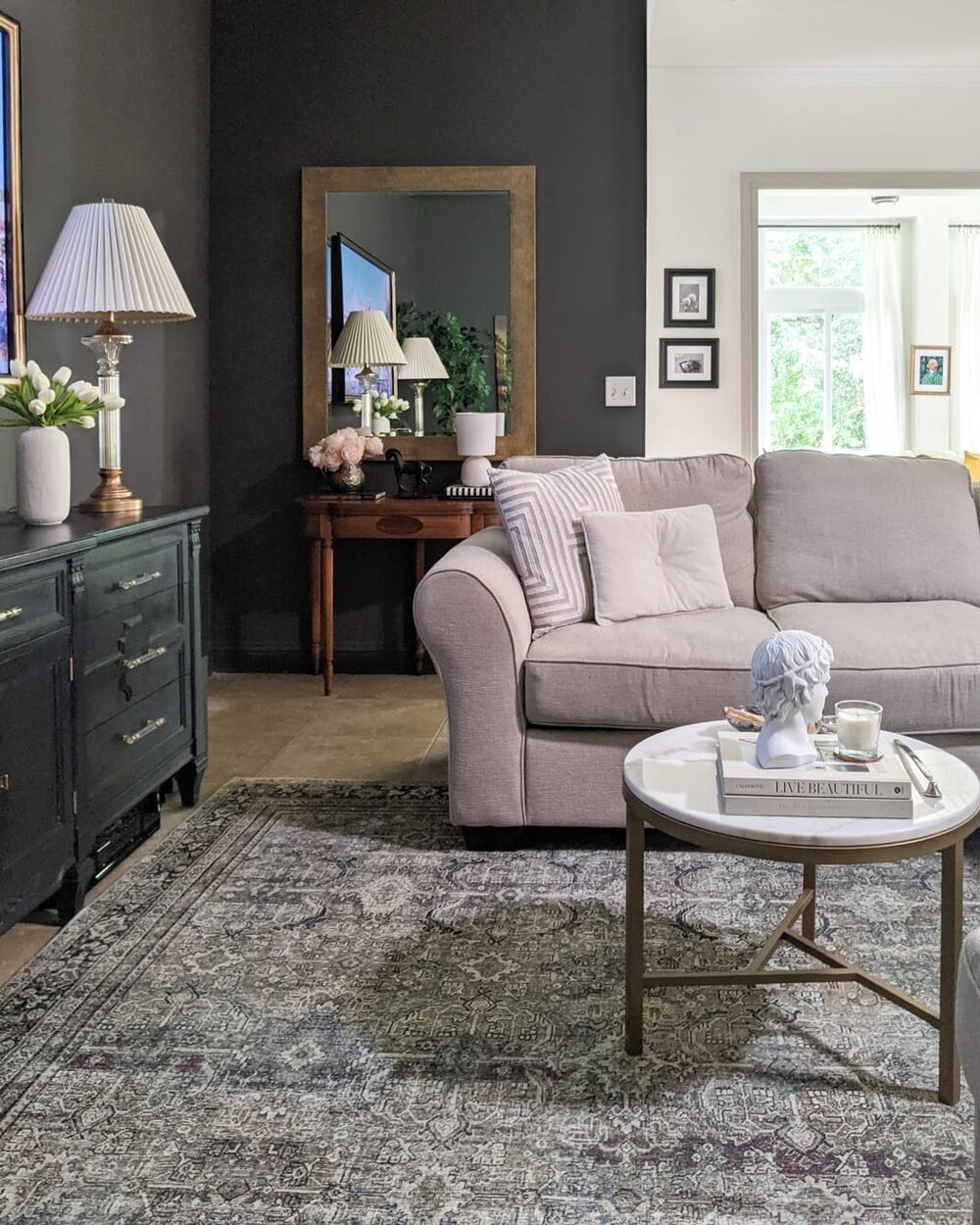 The goal for our living room makeover was to create a space that was not only comfortable to hang out as a family but to also serve as a spot for my husband and I to reconnect after the little ones have gone to bed. 

By using paint, we created a spa