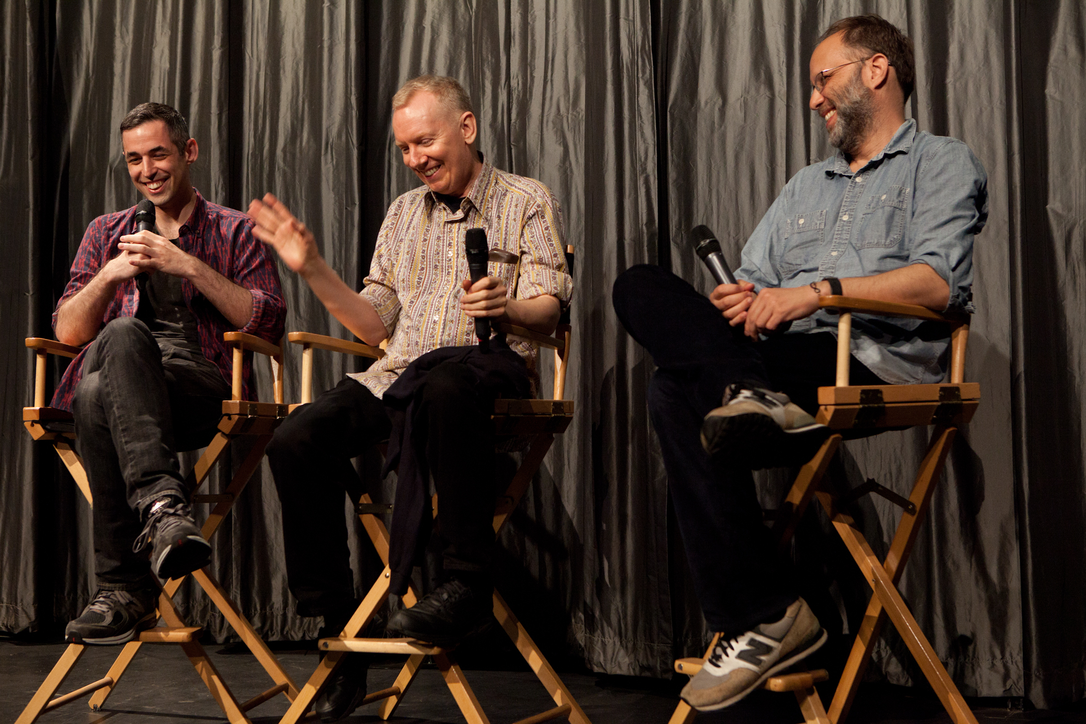  Queer|Art|Film co-curators Adam Baran and Ira Sachs on stage with presenter John Epperson at the May 2014 screening of  OUTRAGEOUS! .&nbsp;(Photo by Ryan Morris) 