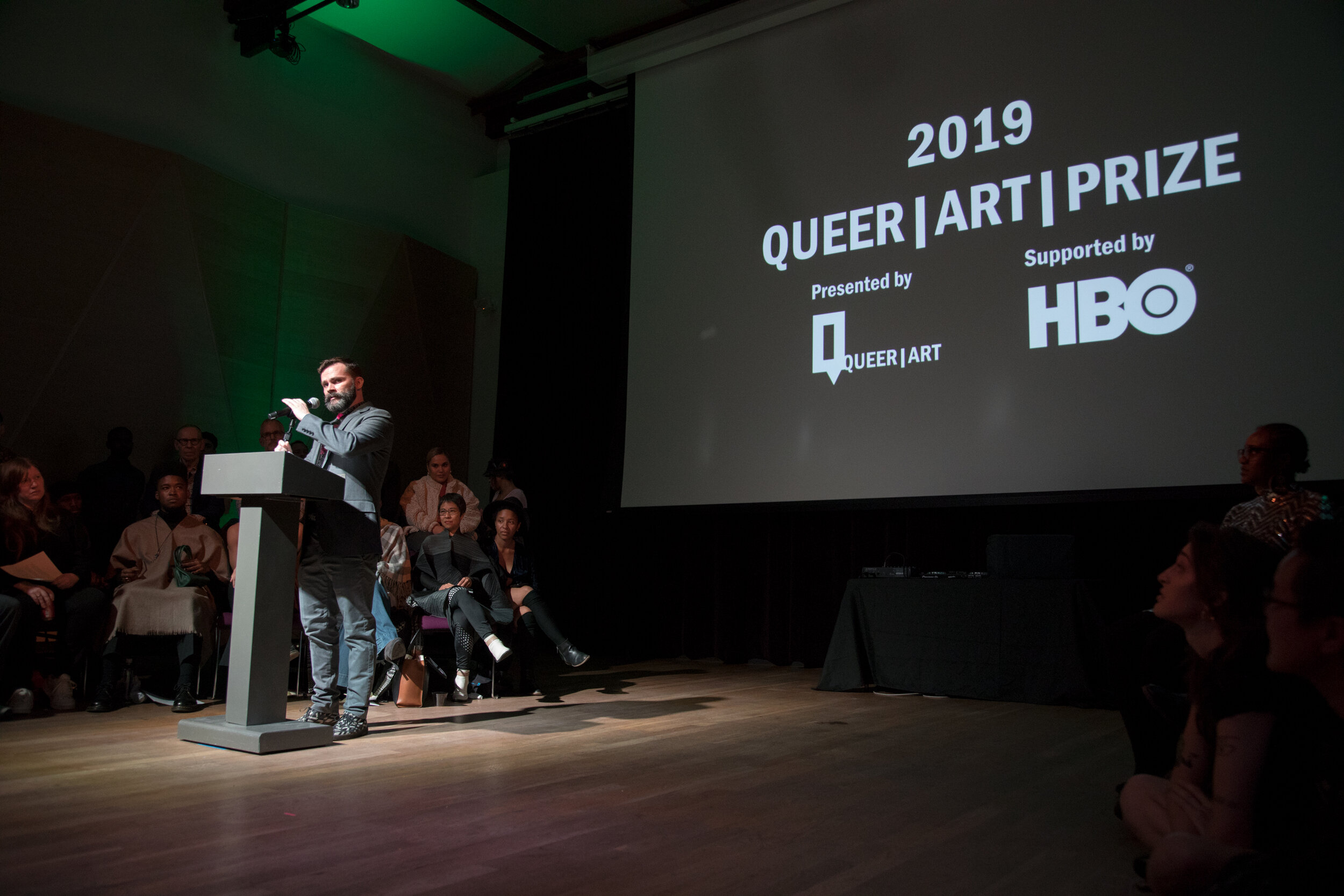 Executive Director Travis Chamberlain during the Queer|Art Ceremony (photo by Cayetana Suzuki)