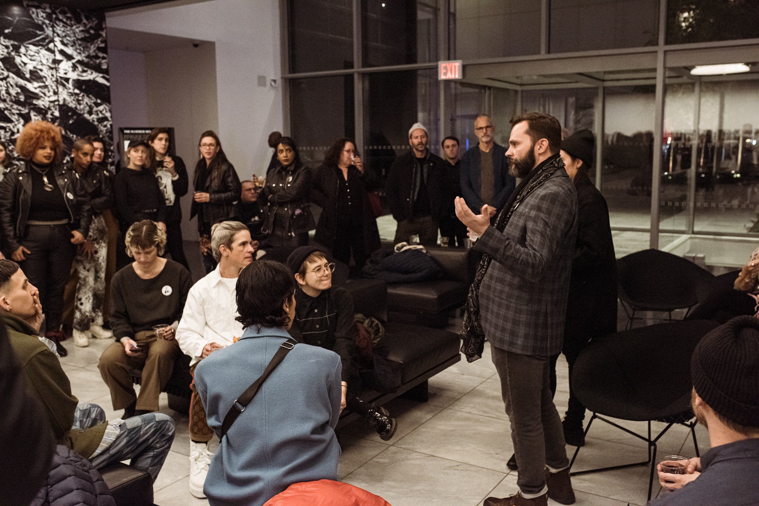  Travis Chamberlain speaking at the Hammer Mix at MoMA in 2019. 