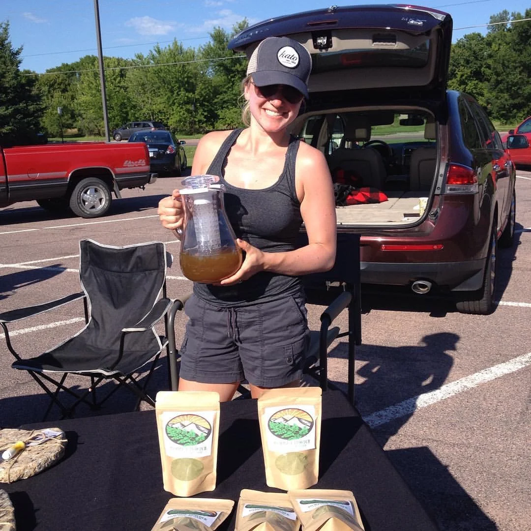 Sampling Moringa Lemonade at the North Mankato Farmer's Market