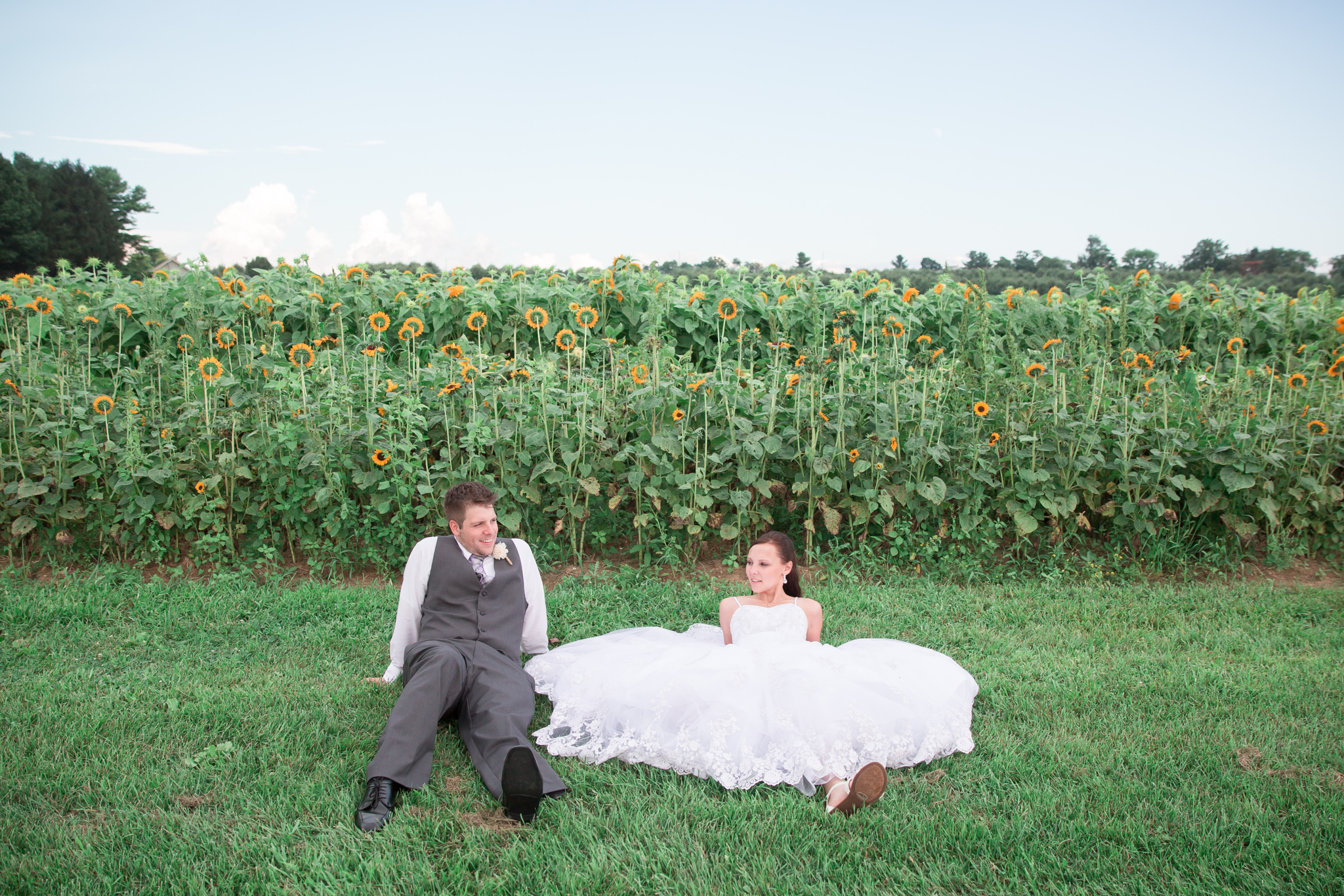 Ok, so I know this isn't a posed photo and they have soooo many awesome photos from the day! But I love how when Christina wanted a break, she had no problem just plopping down where she was....right in front of all the sunflowers :) Of course they still look awesome just chillaxin.