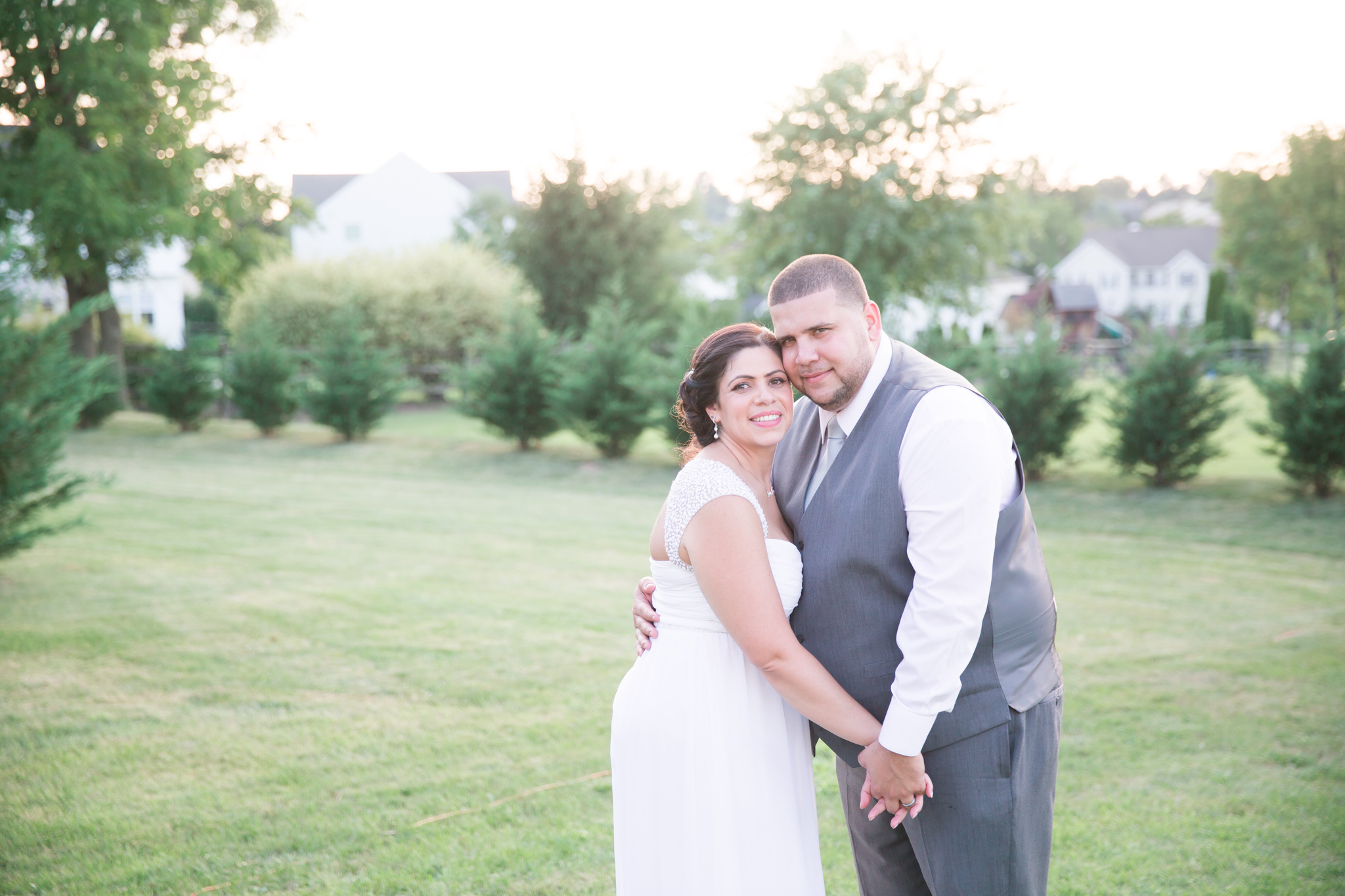 Backyard wedding under a white tent? Absolutely! 
