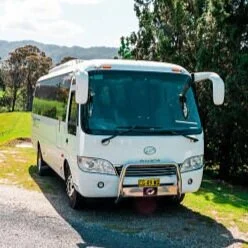 27 seater Yutong D7 executive coach for mid-size group wine tours on the South Coast