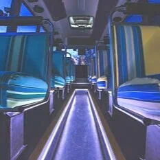 18 seater Mercedes Sprinter party bus interior with leather seats and LED lighting