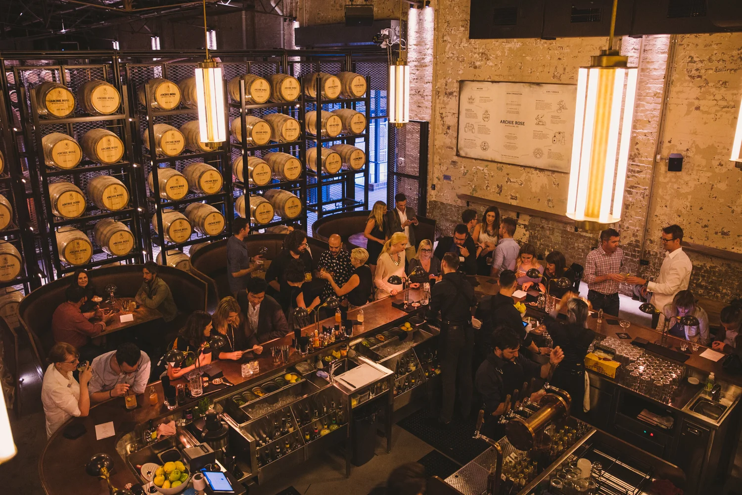Large group at the Archie Rose distillery bar on an inner-west Sydney Christmas brewery tour