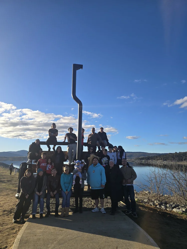 Group by Lake Jindabyne on the bus to the snow