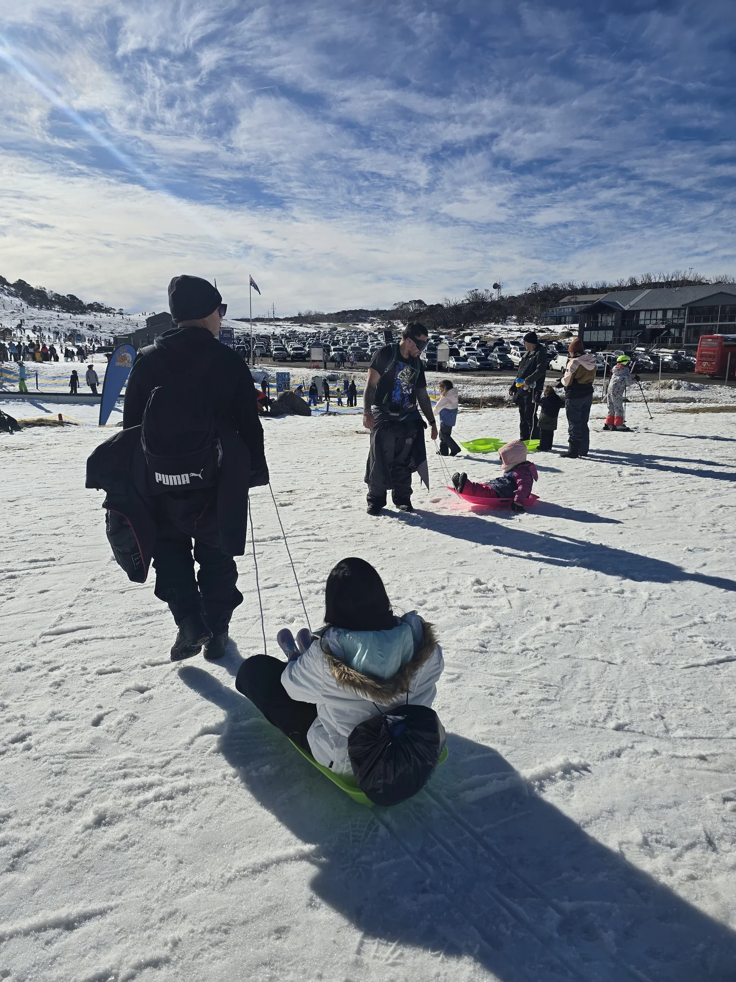 Family enjoying a snow trip in the Snowy Mountains