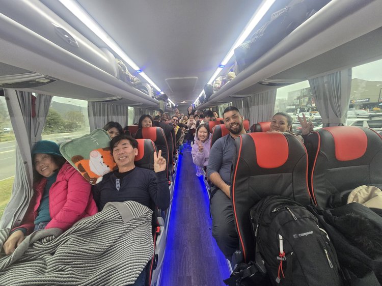 A full coach of guests on a ski trip from Sydney