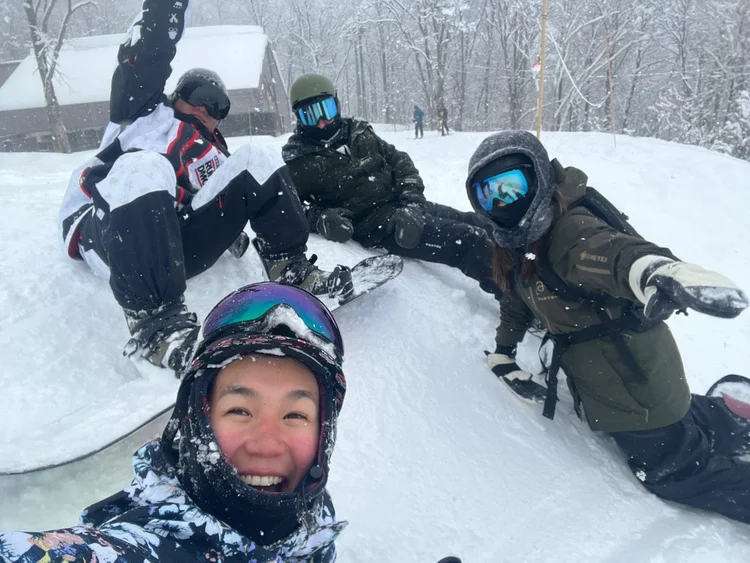Group of mates in fresh powder on a snow trip from Sydney