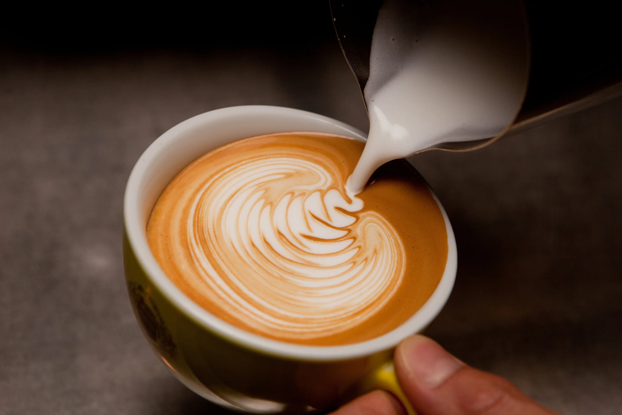 swiss deli latte pour.jpg