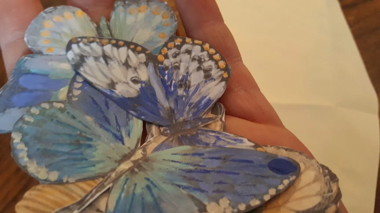 I love the shimmer and detail each individual butterfly captures.