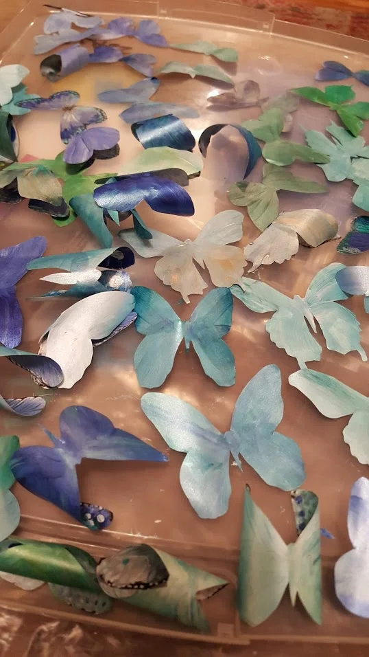 AFTER EACH BUTTERFLY WAS CUT OUT - IT WOULD BE HAND COLORED ON IT'S BACK WITH CUSTOM MIXED IRIDESCENT SHIMMER PAINT