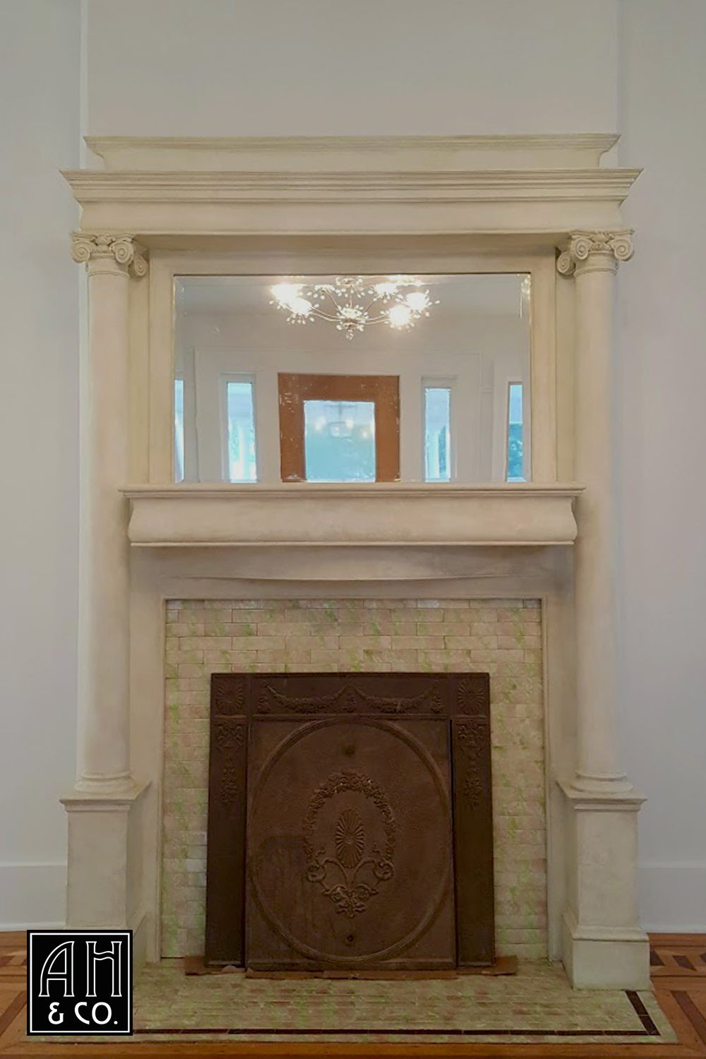 AFTER: THE MANTLE IS COMPLETE WITH A CUSTOM STONE TREATMENT