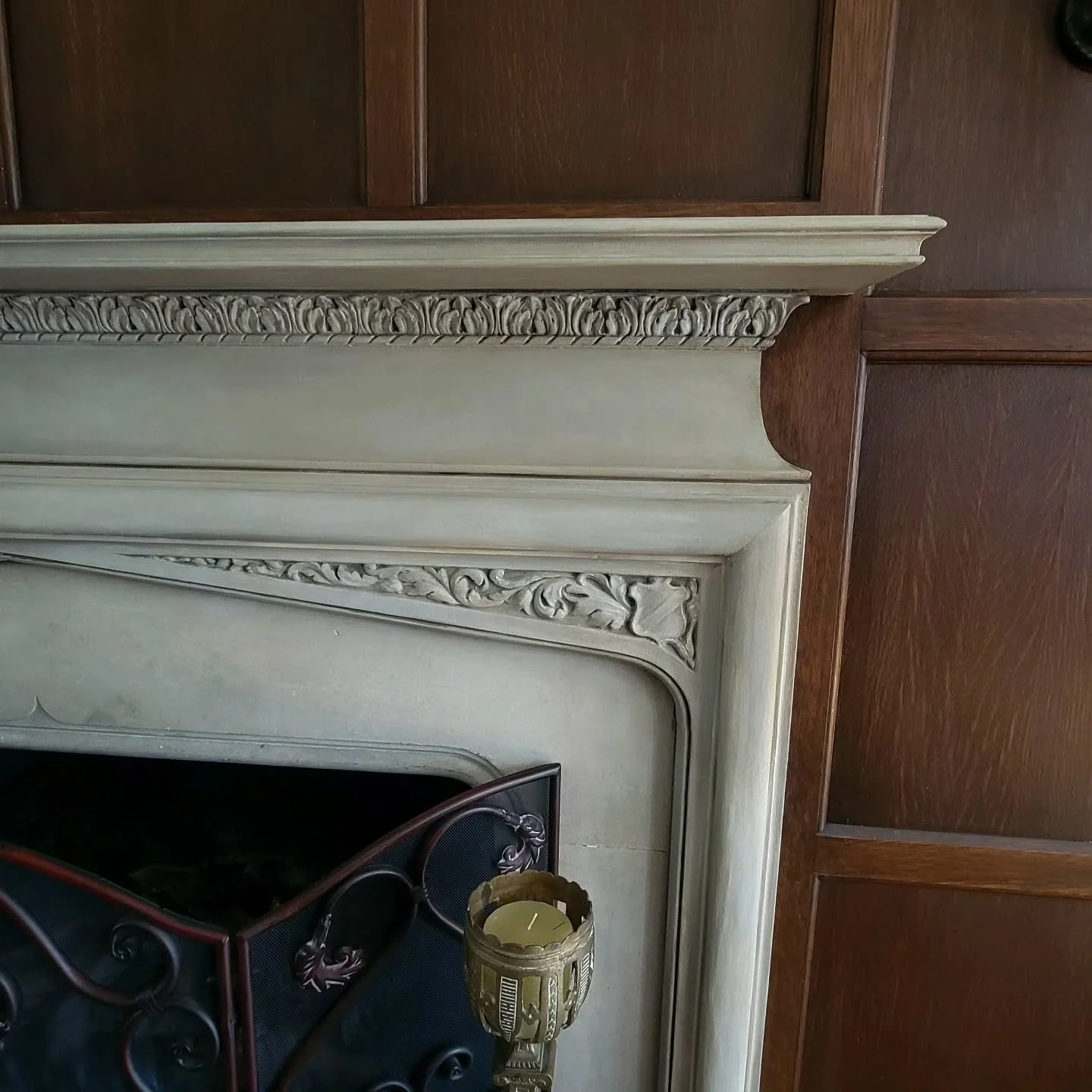 Tell me this wood mantle finished in an antique stone patina was not always meant to be this way? It makes the mantle so much more substantial when you walk in.  Also, the incredible detail pops, so all of the original craftsmanship can truly be appr